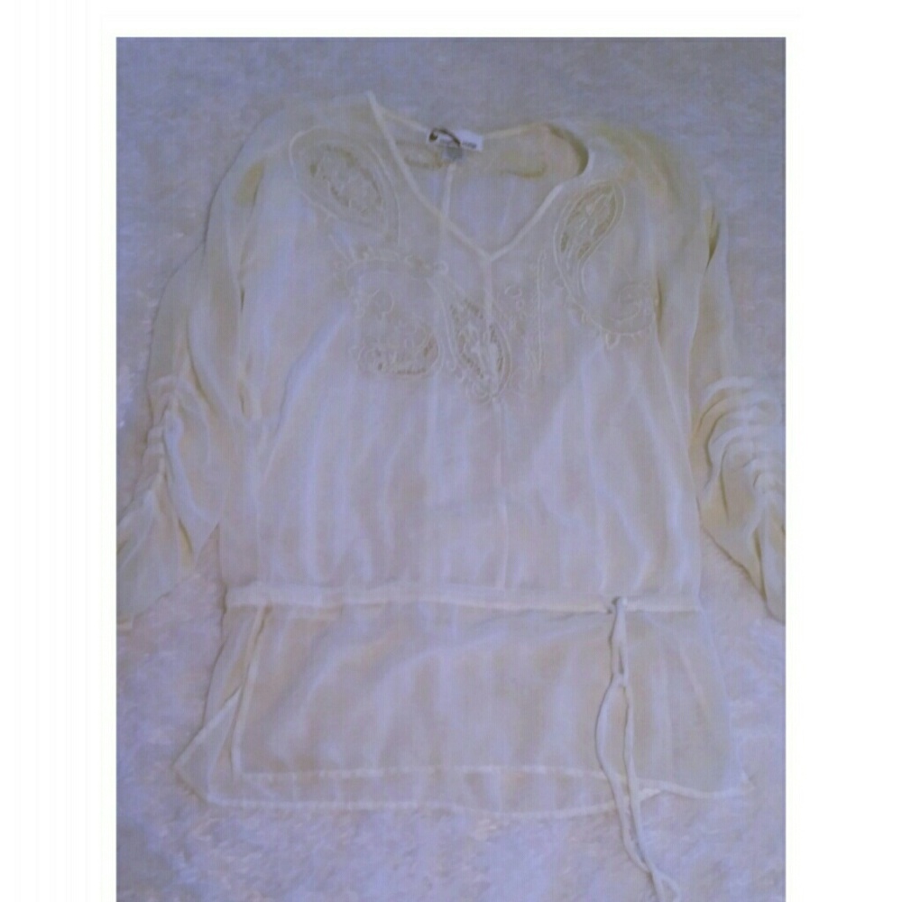 Lovely sheer cream blouse